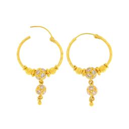 Discover the gold hoop earrings for women in Gold